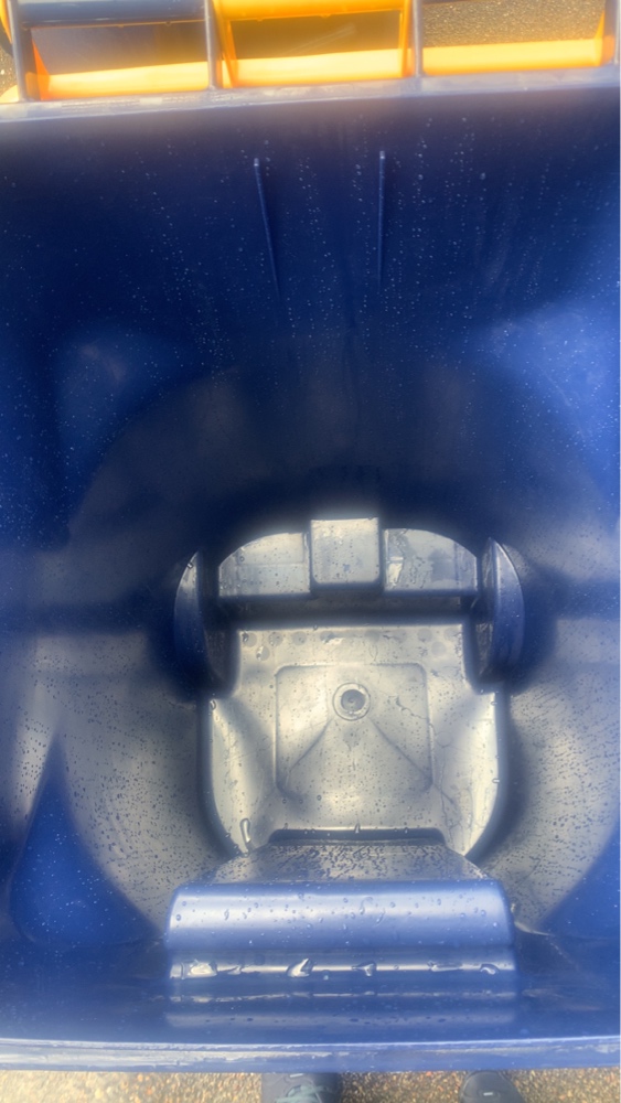 Clean sanitized trash bin after Easy Wash service